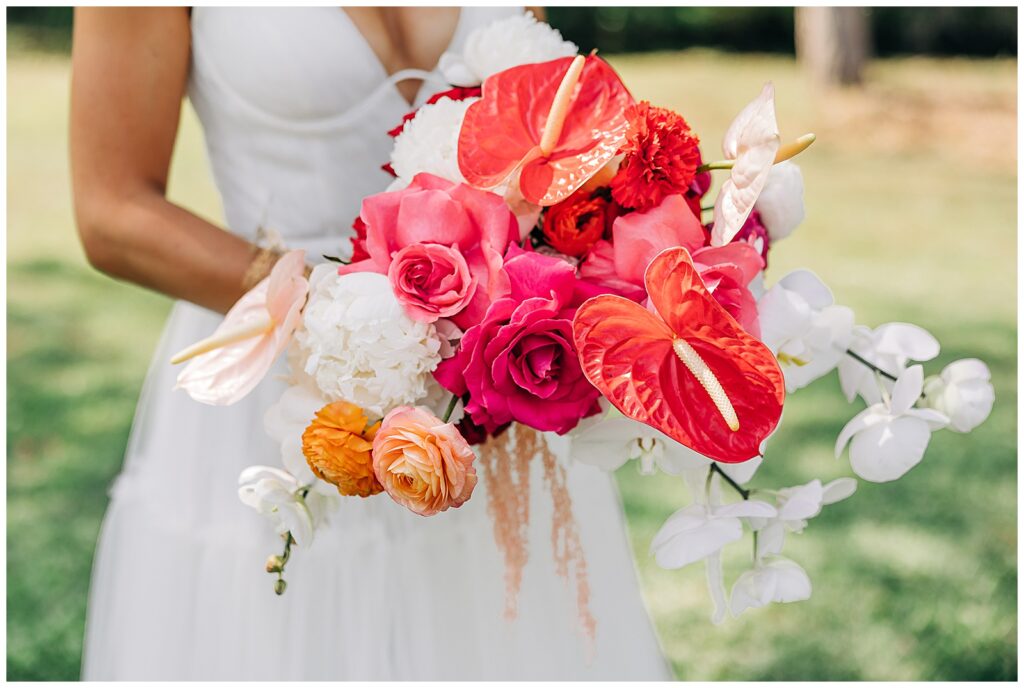bride's bouquet as she holds it for Pike Lake wedding