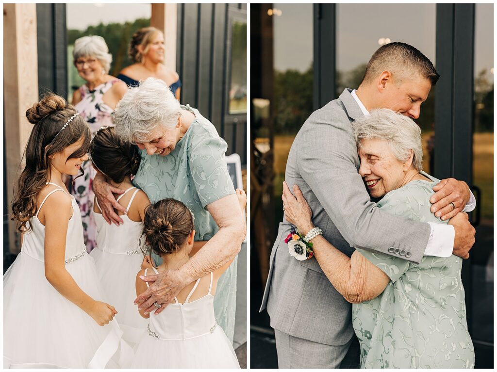 Grandma hugging groom and flower girls